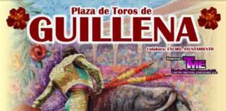 Cabecera del cartel anunciador en Guillena.